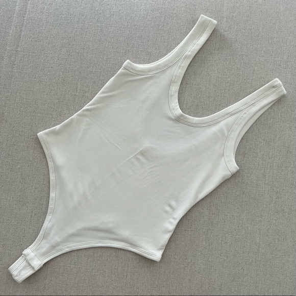 ALEXANDER WANG x UNIQLO Heat Tech Ribbed Sleeveless Bodysuit in White - Picture 1 of 4